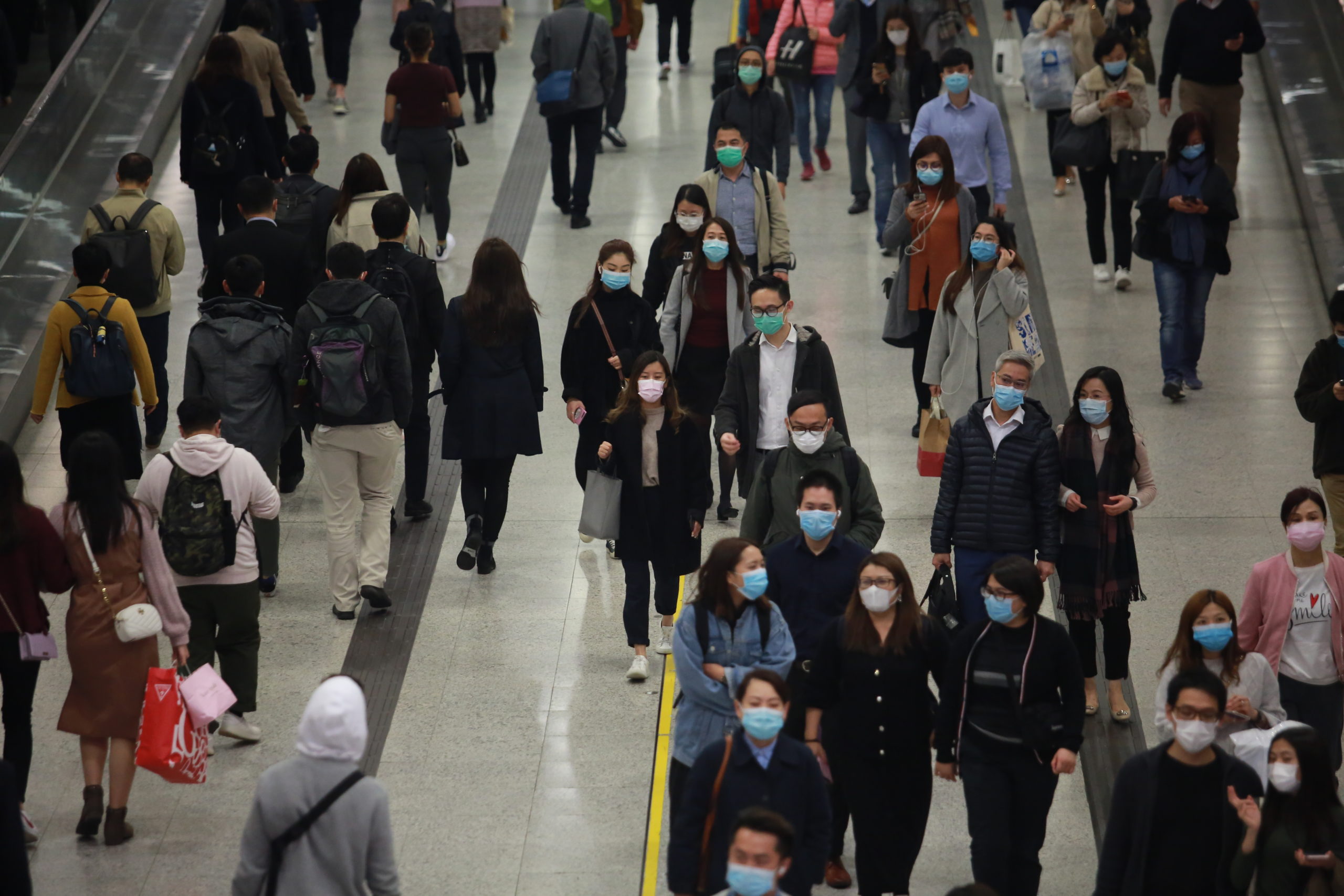 People in city wearing medical masks