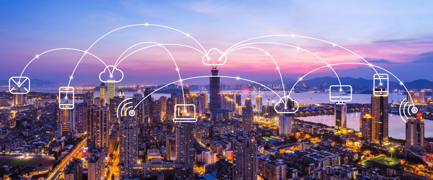 How to Onboard Virtually. City skyline with drawing of connected devices linked throughout.